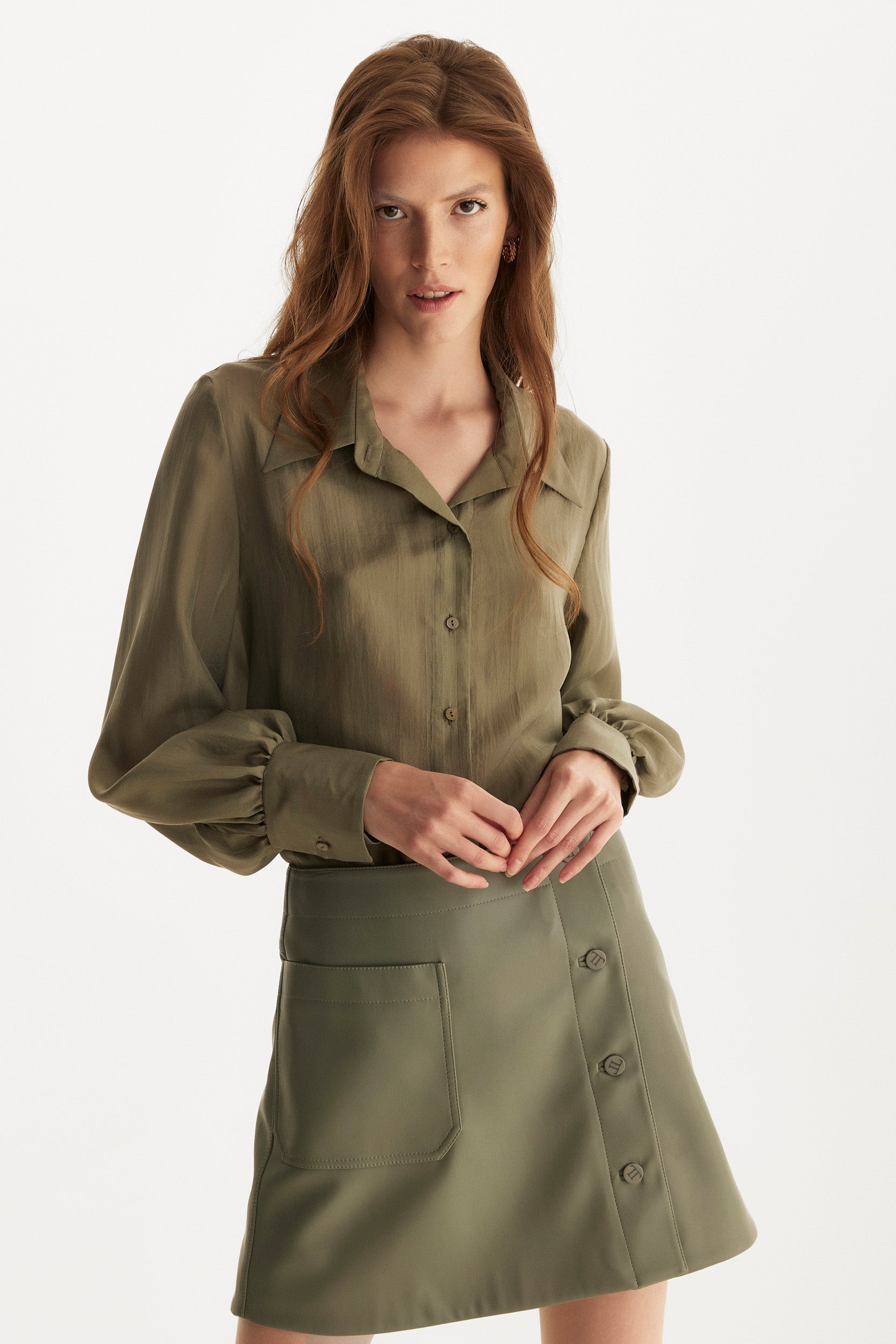 Green button-up silk shirt