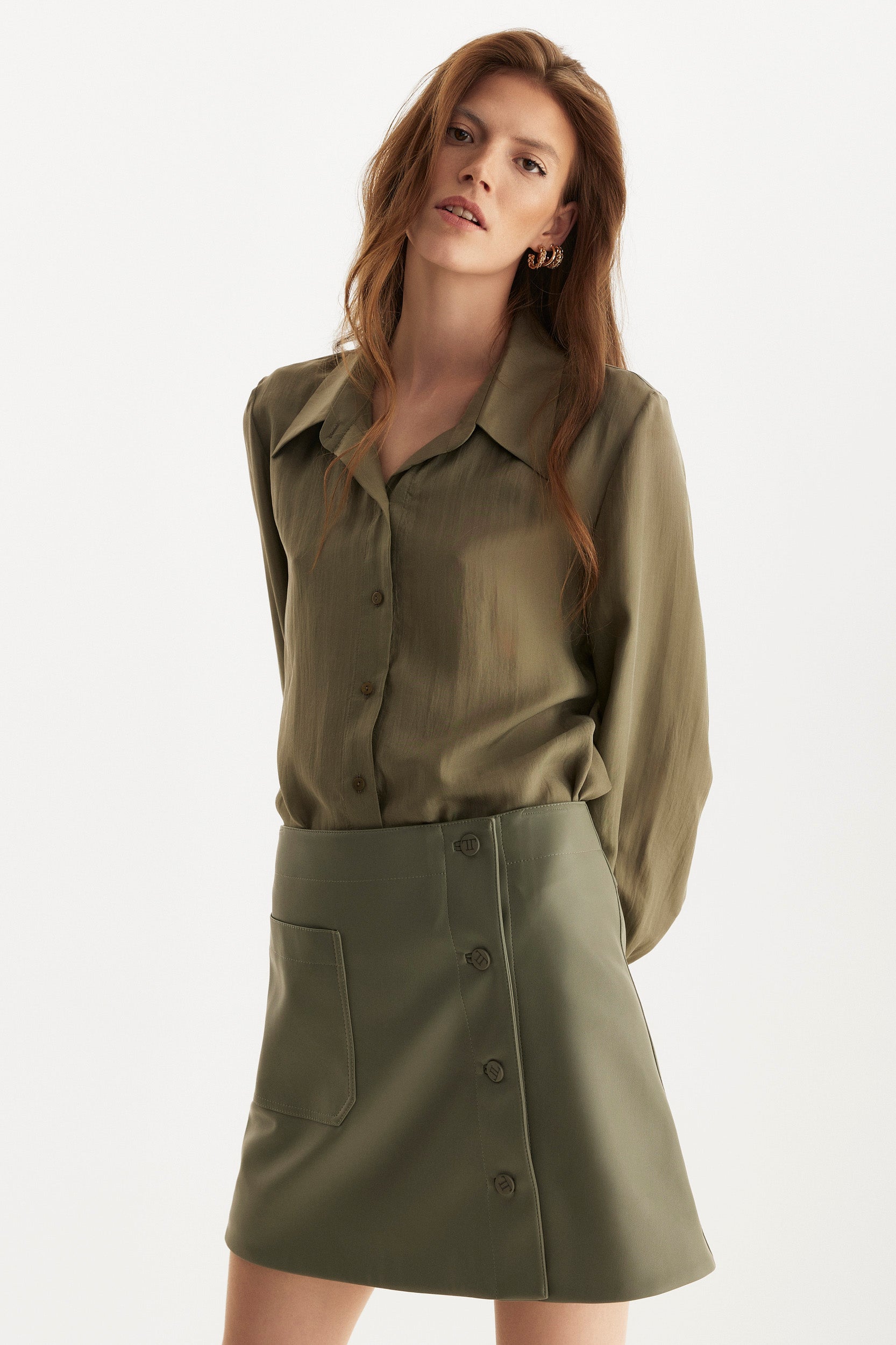 Green button-up silk shirt