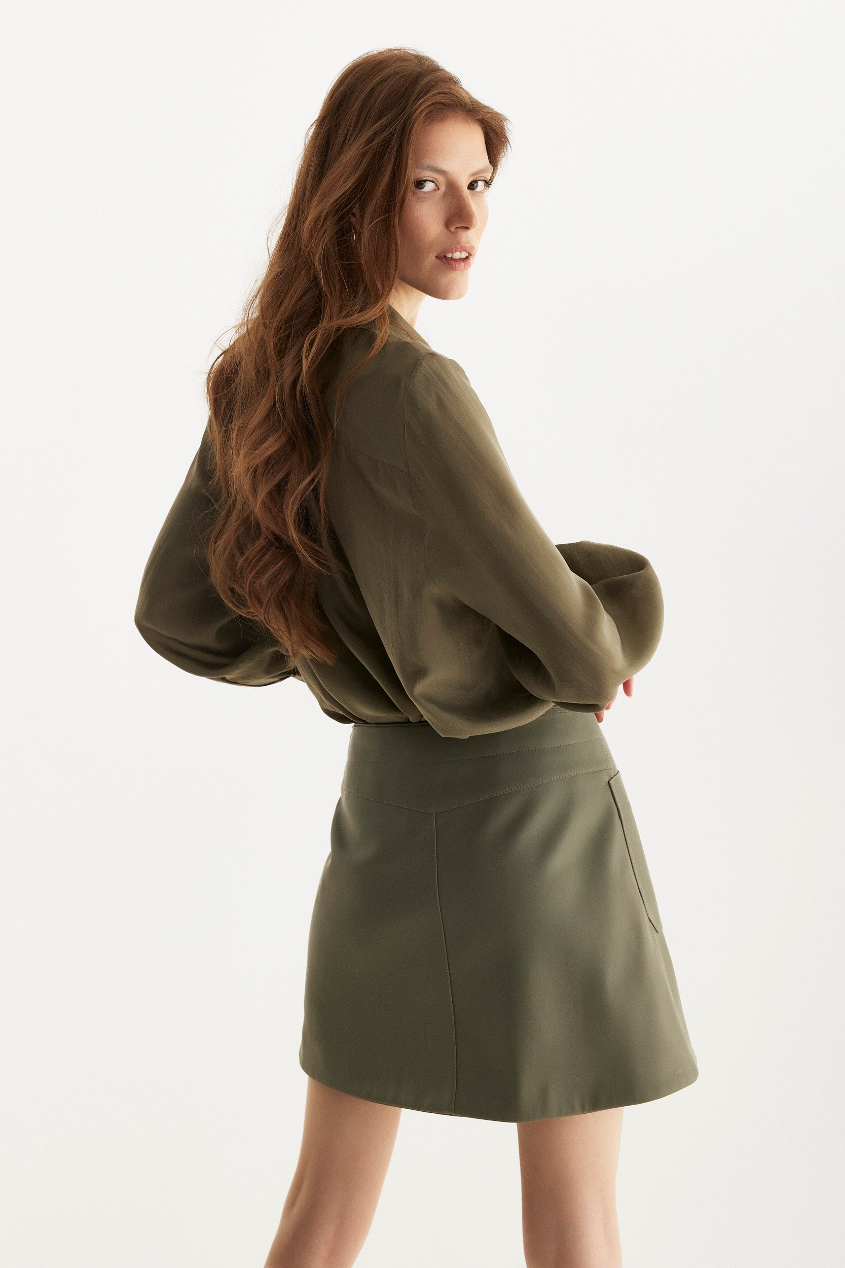 Green button-up silk shirt