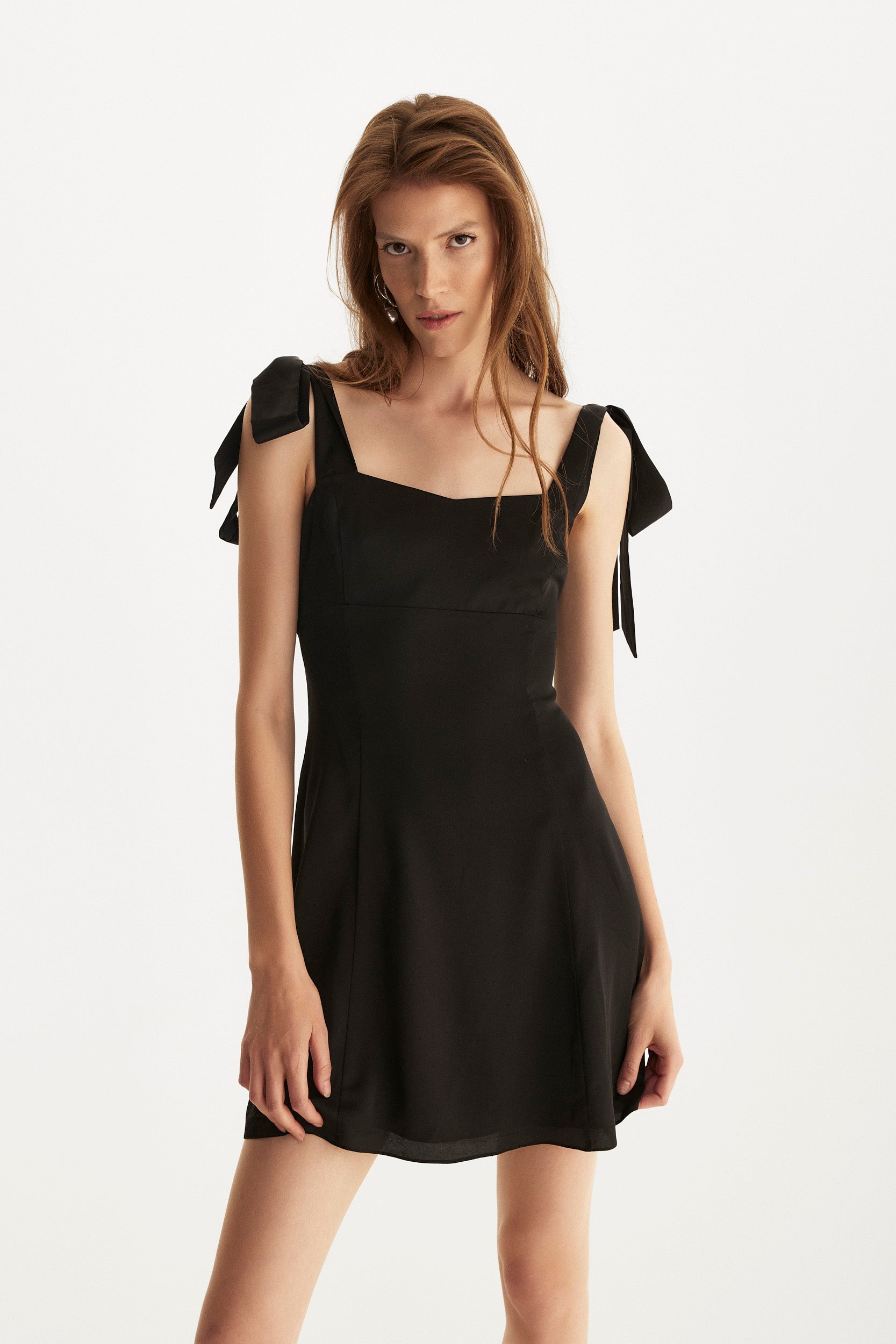 Ribbon-strap flared mini dress in black