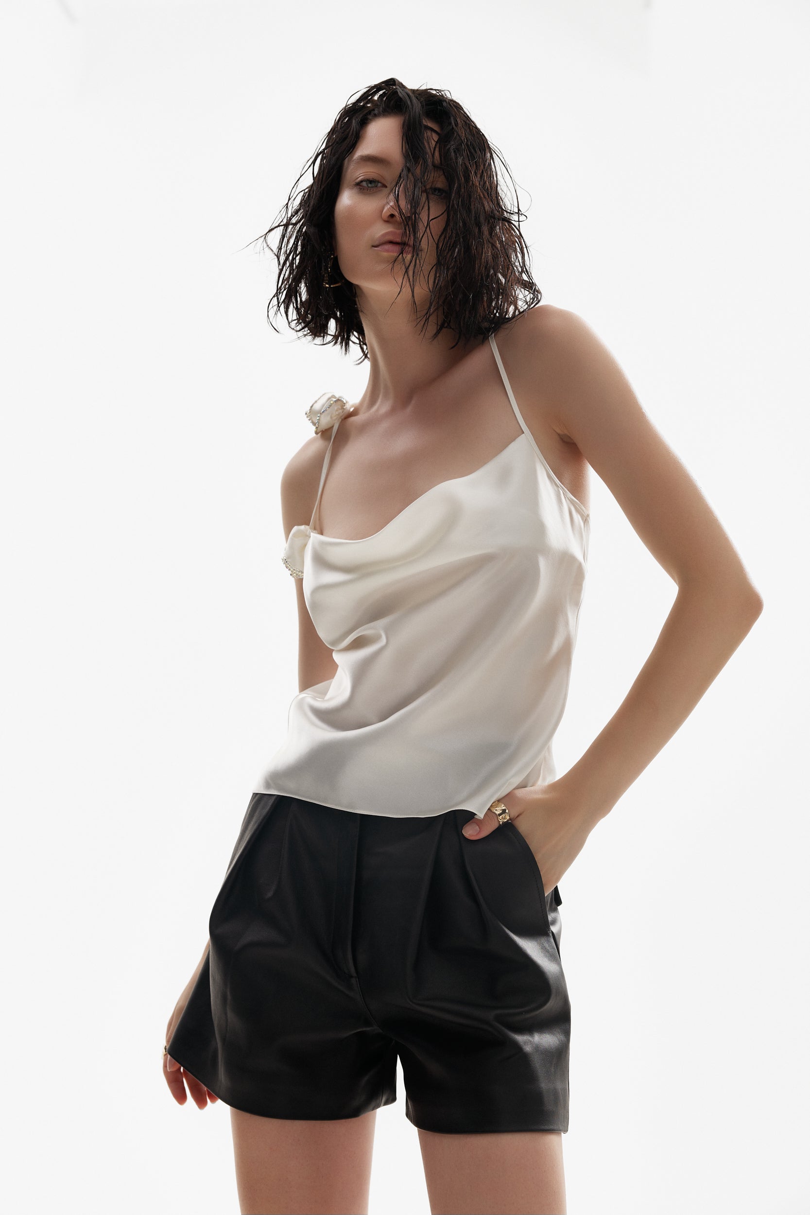 Rosette appliqués silk top in ivory