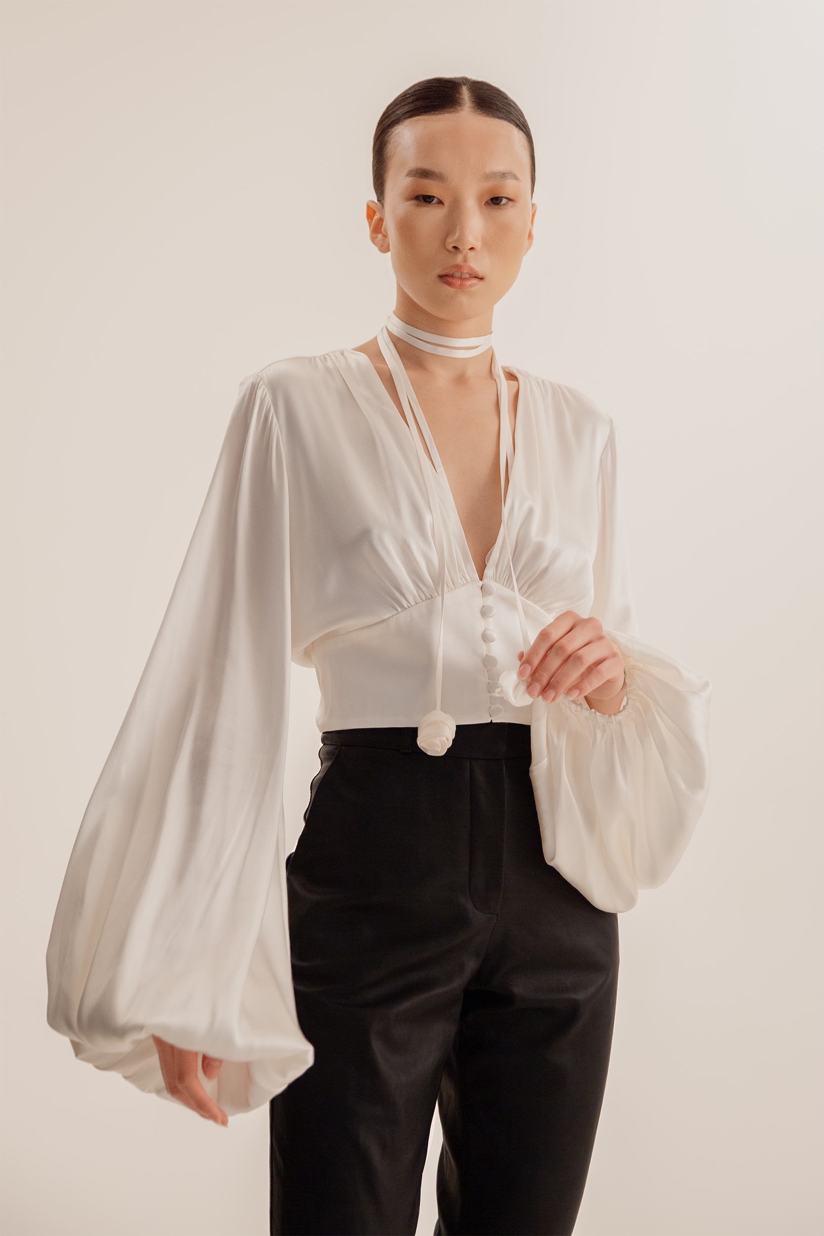 Ample-sleeve satin top in white