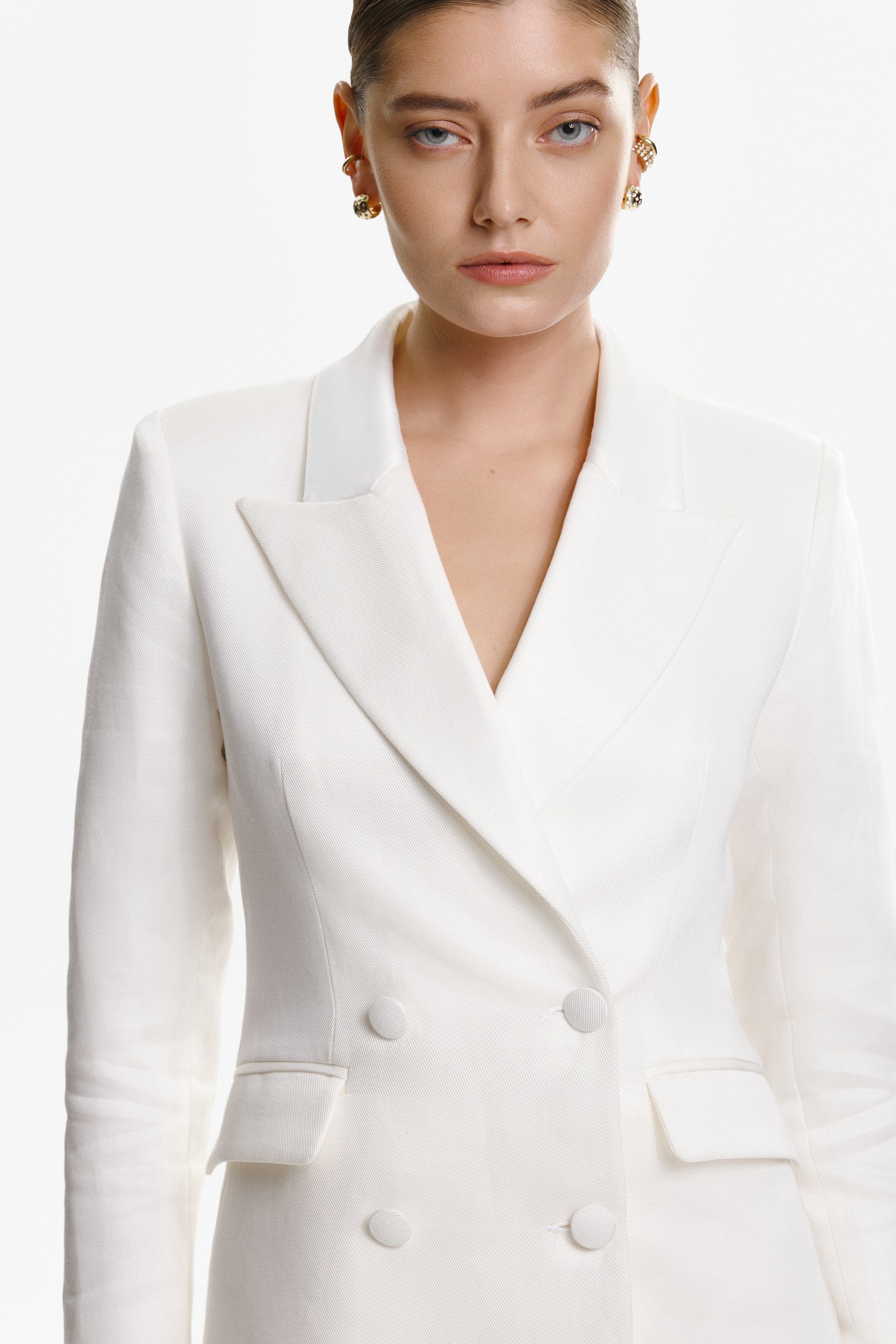 Double-breasted white linen blazer