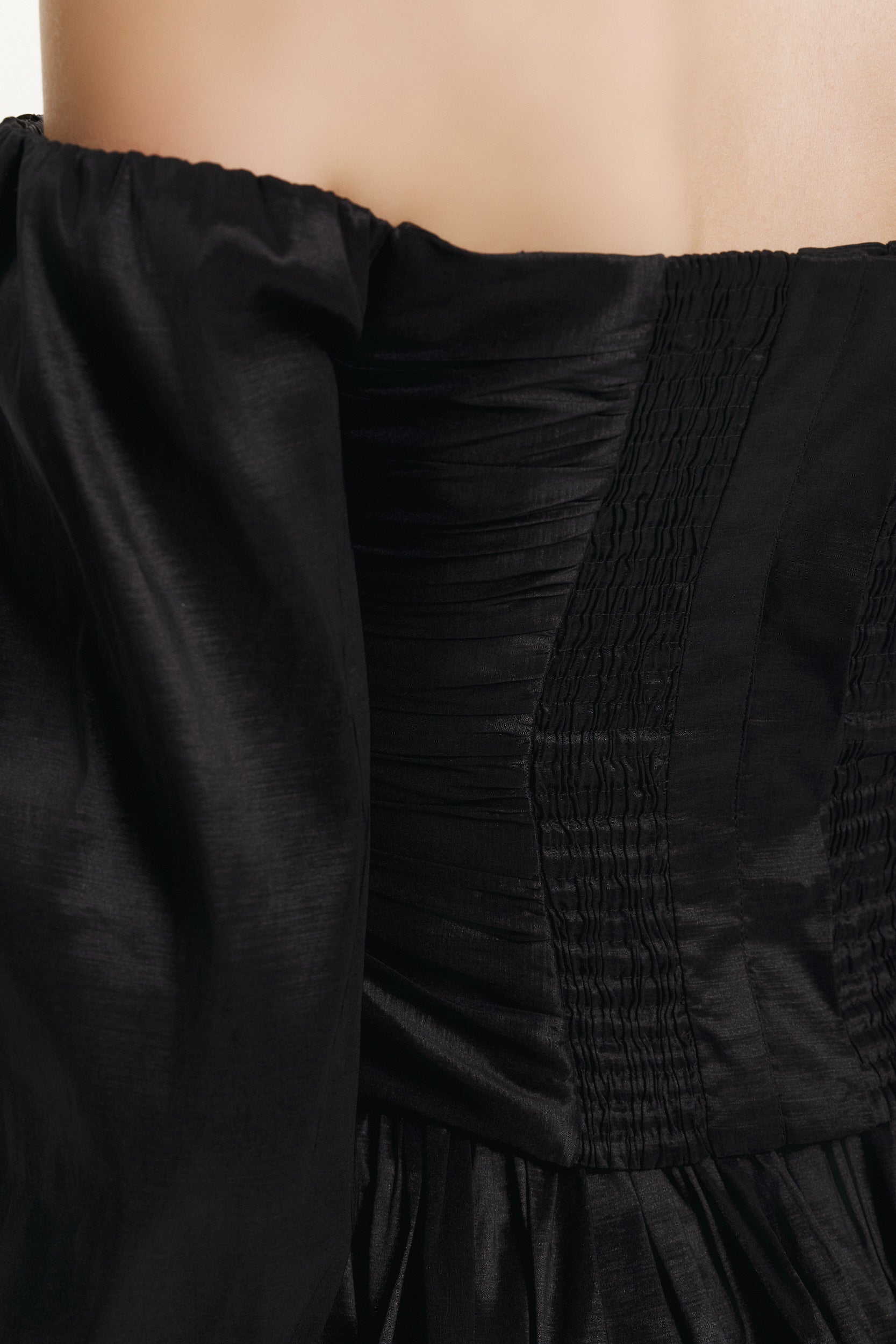 Off-the-shoulder black taffeta blouse