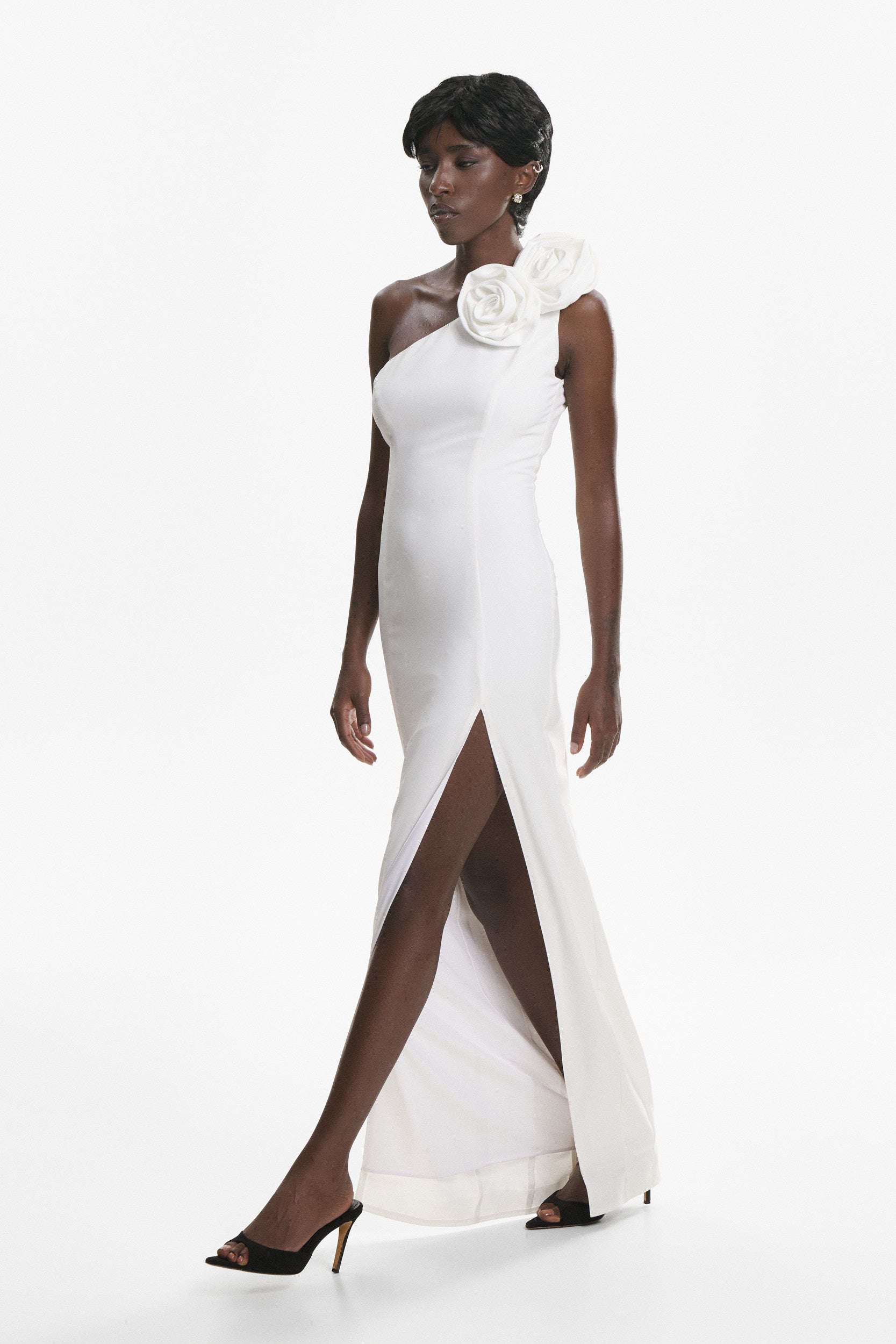 Rosette-appliqué asymmetric crepe dress in white