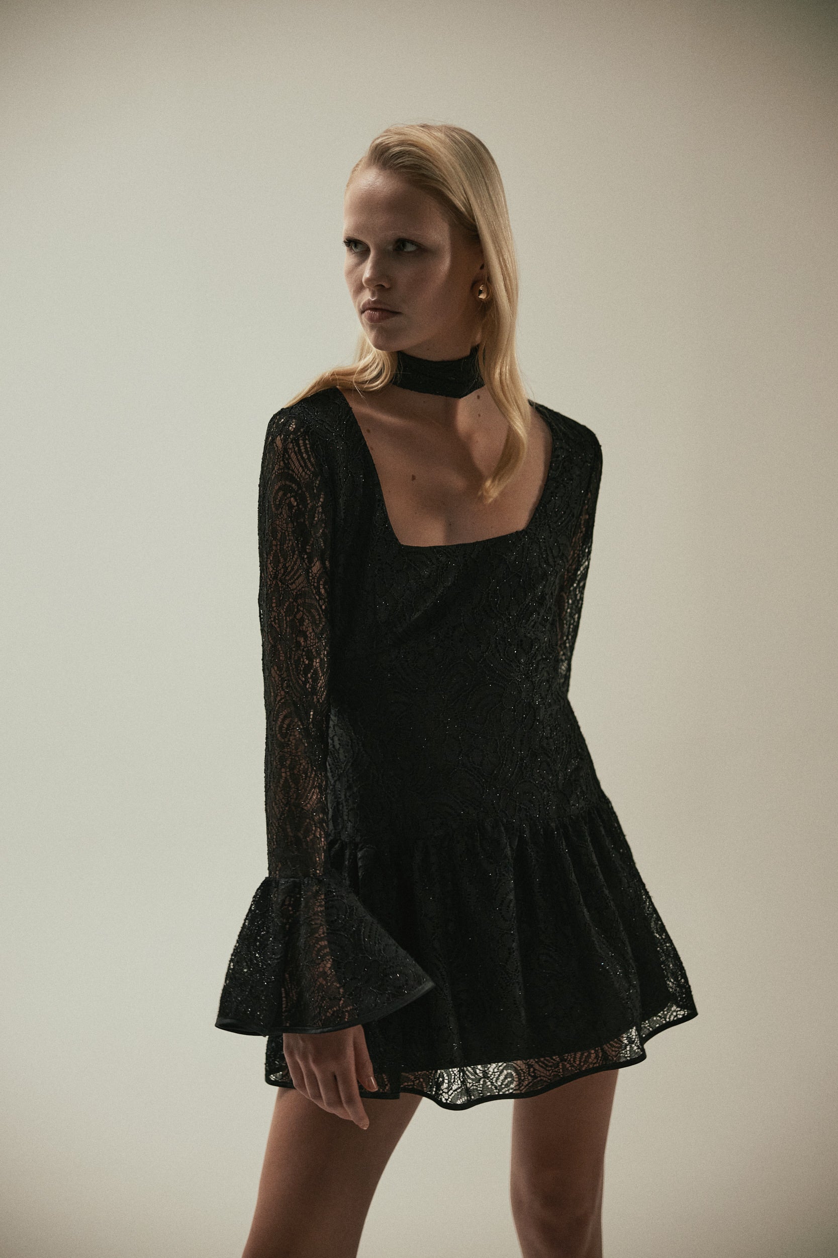 Black lace mini dress with ruffles