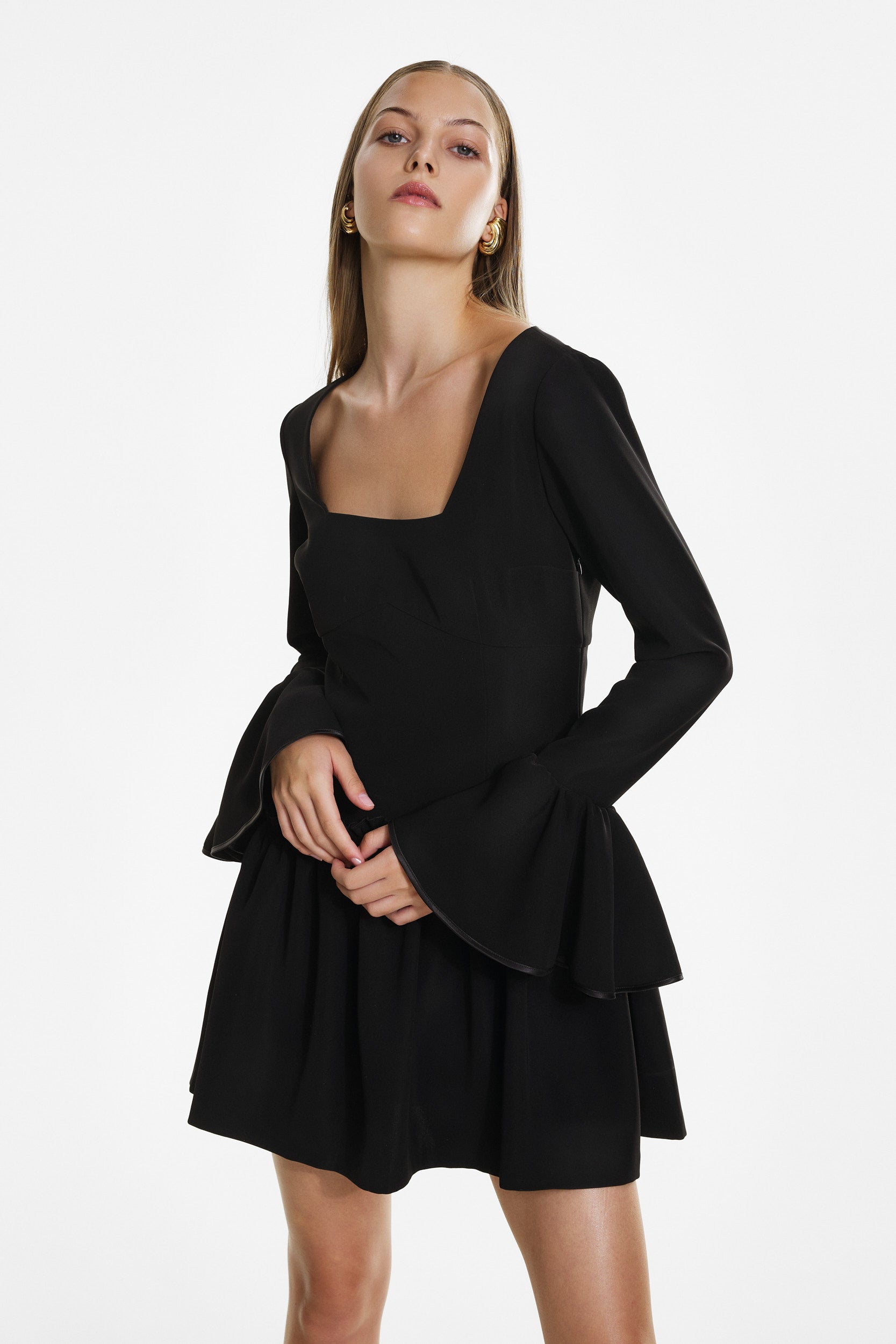 Mini black dress with ruffles