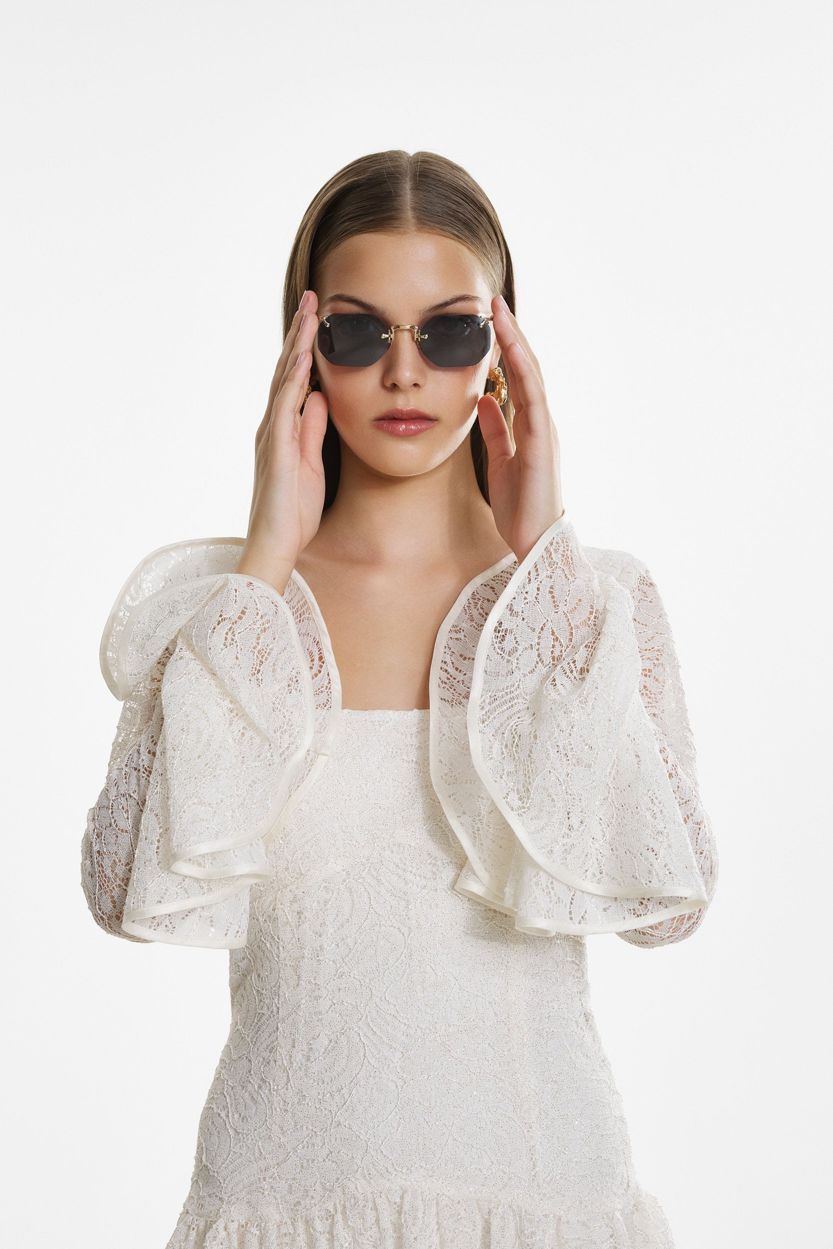 White lace mini dress with ruffles