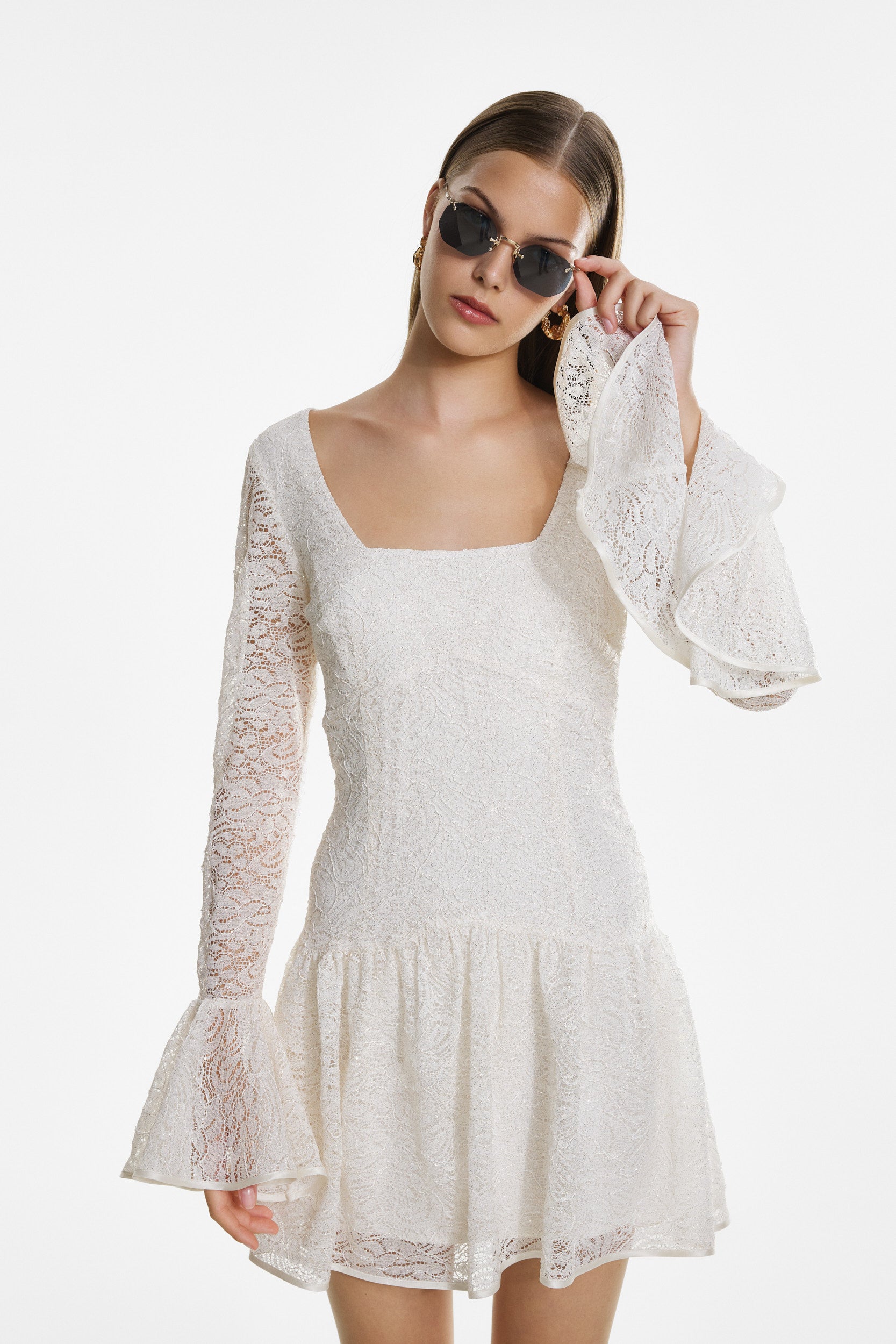 White lace mini dress with ruffles