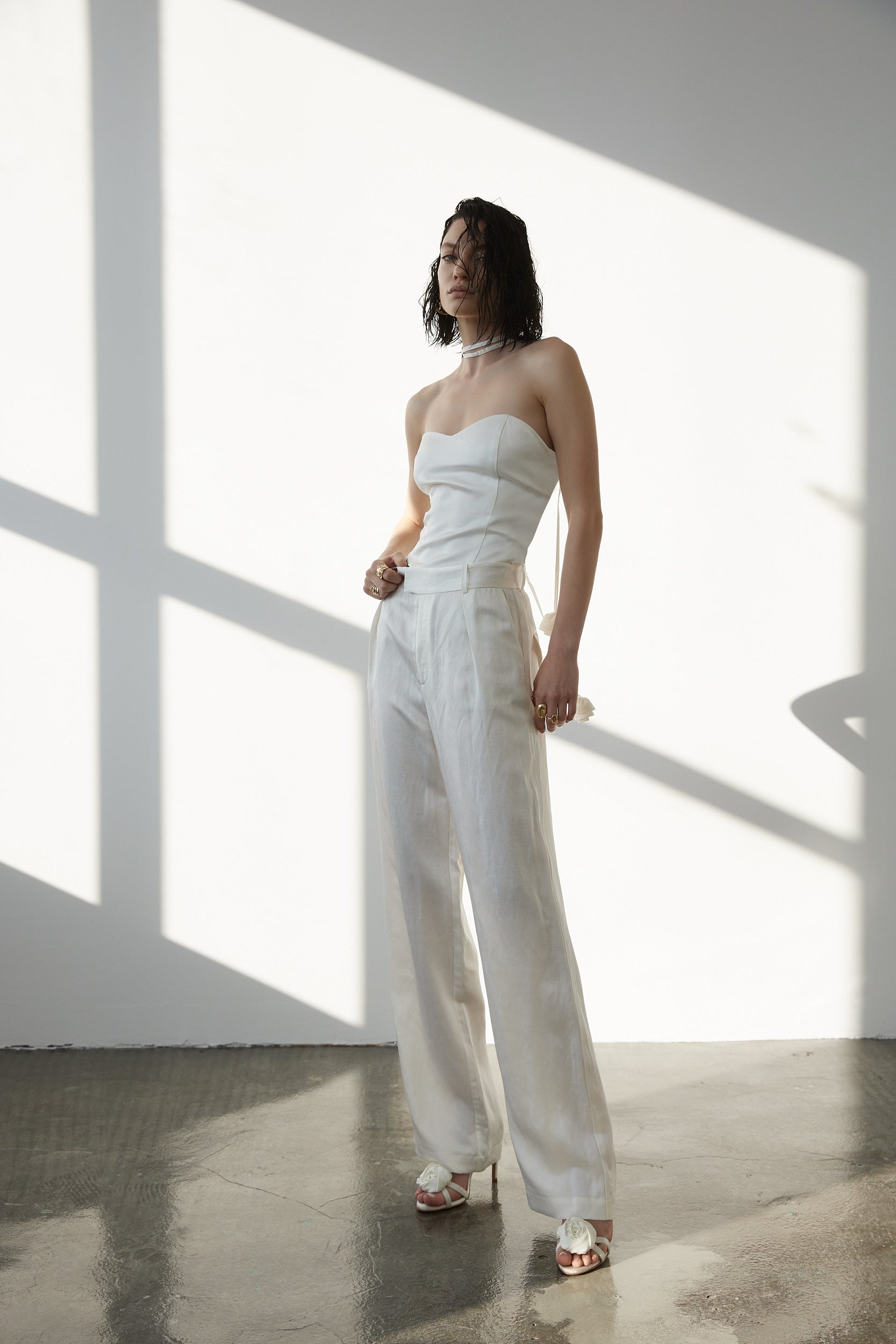 Wide-leg trousers in white linen