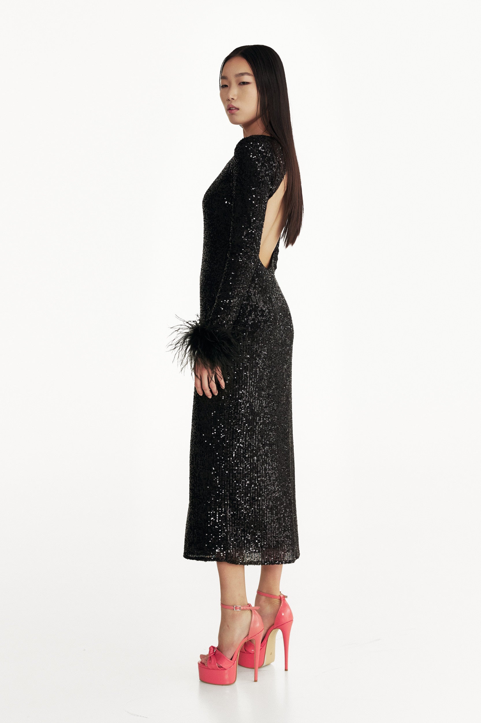 Open-back sequins dress with feathers in black