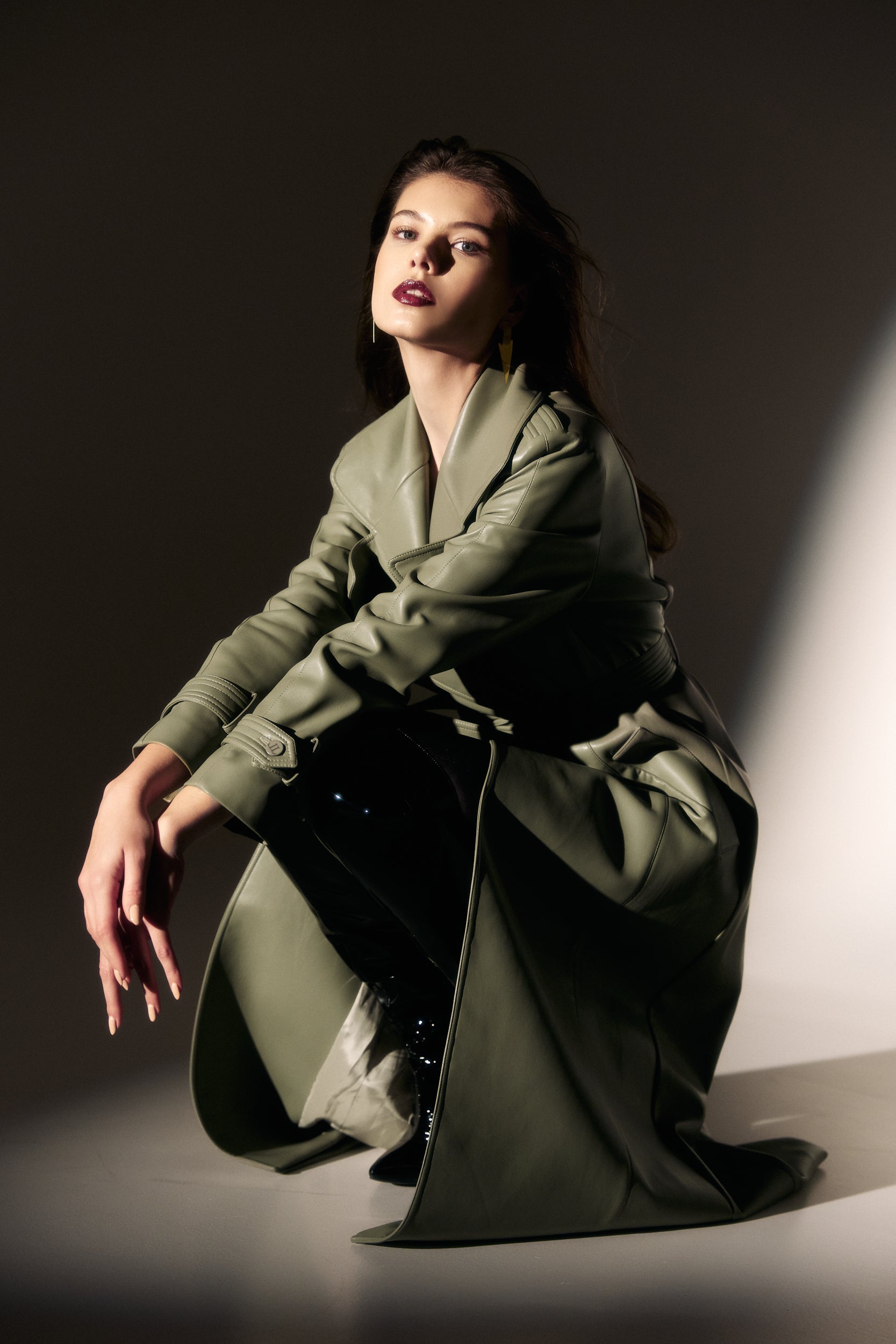 Vegan leather trench coat in green