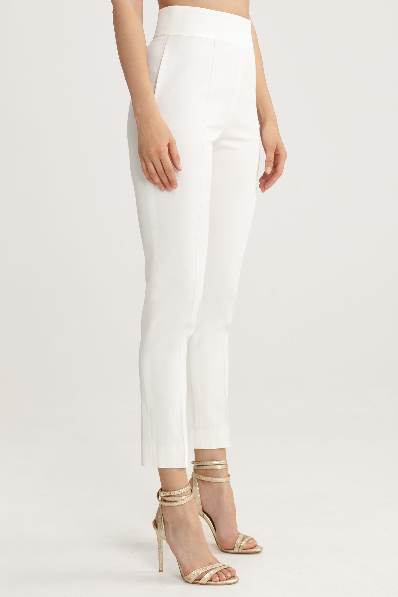 High-waisted white trousers
