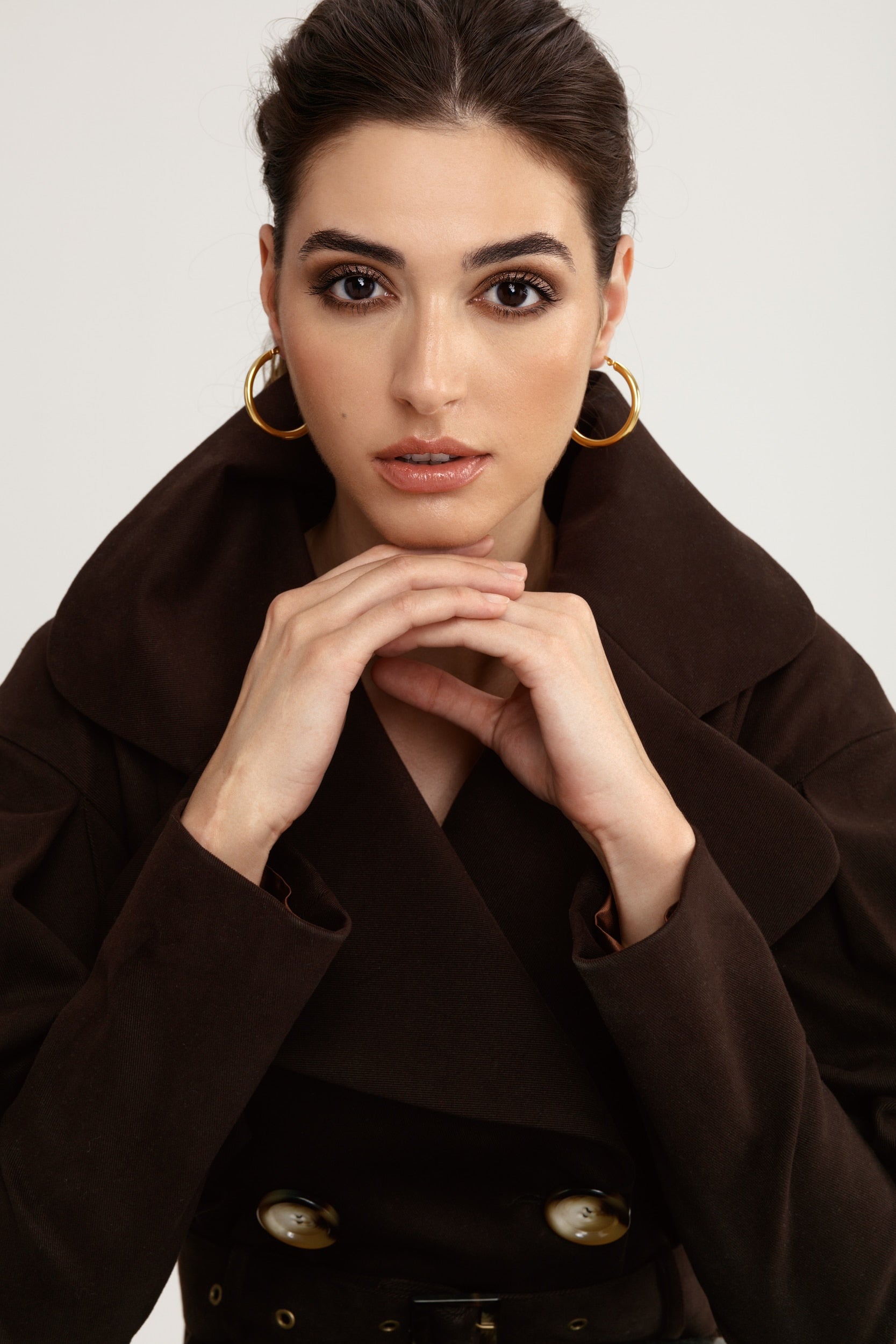 Statement pleated shoulders trench coat in chocolate brown