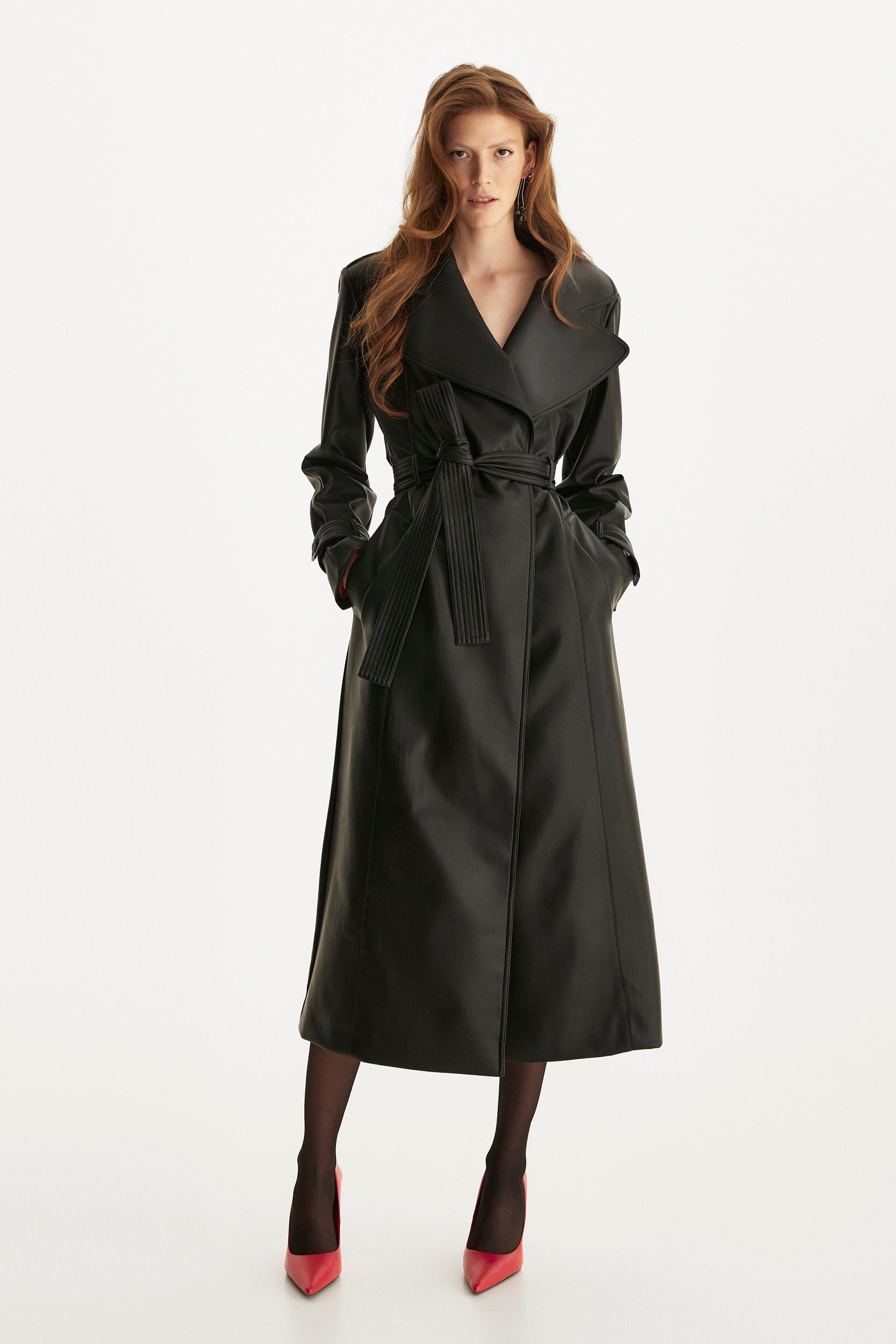 Belted leather trench coat in black