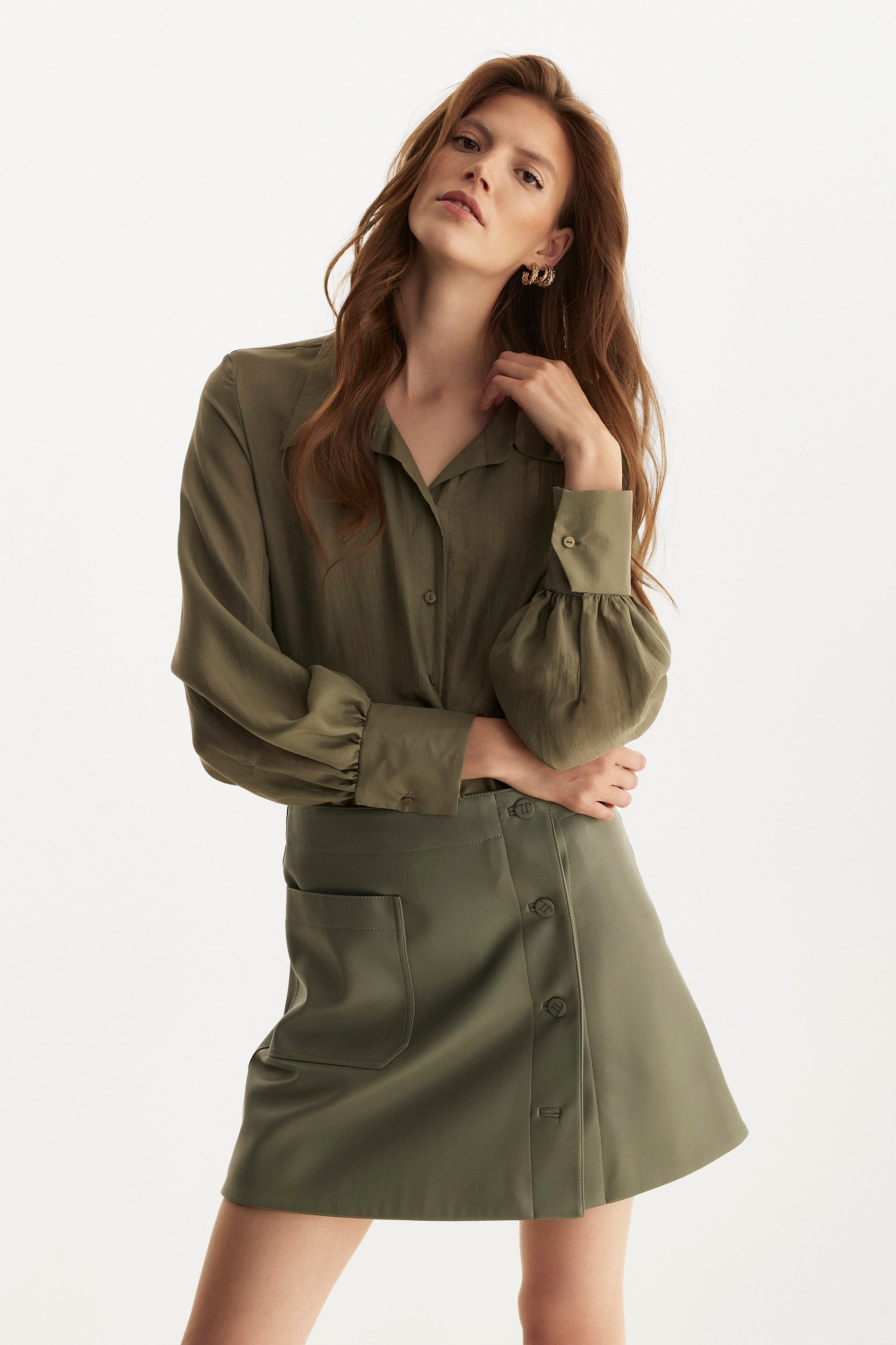 Green button-up silk shirt