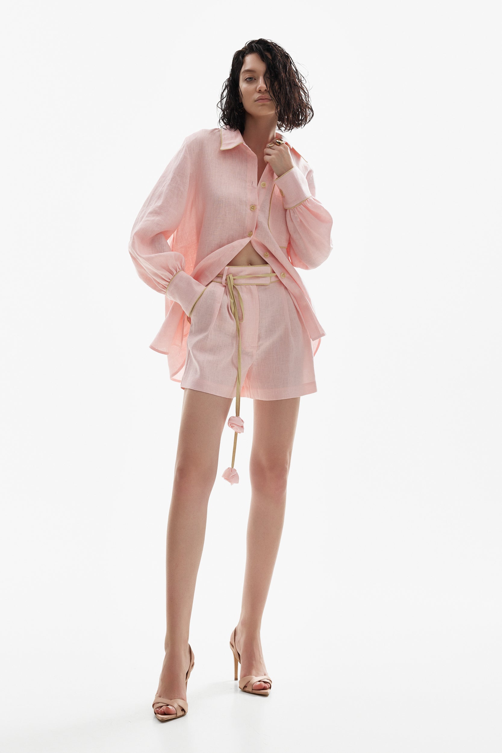 Linen shorts in pink with rosettes sash