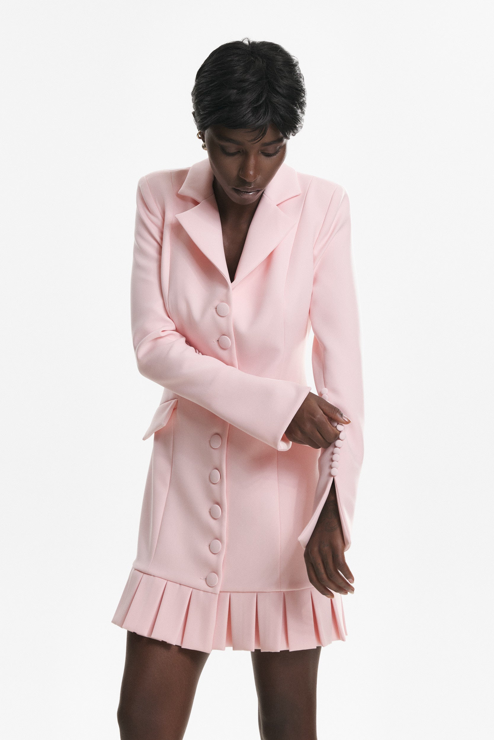 Elegant mini pink dress with buttons and pleats