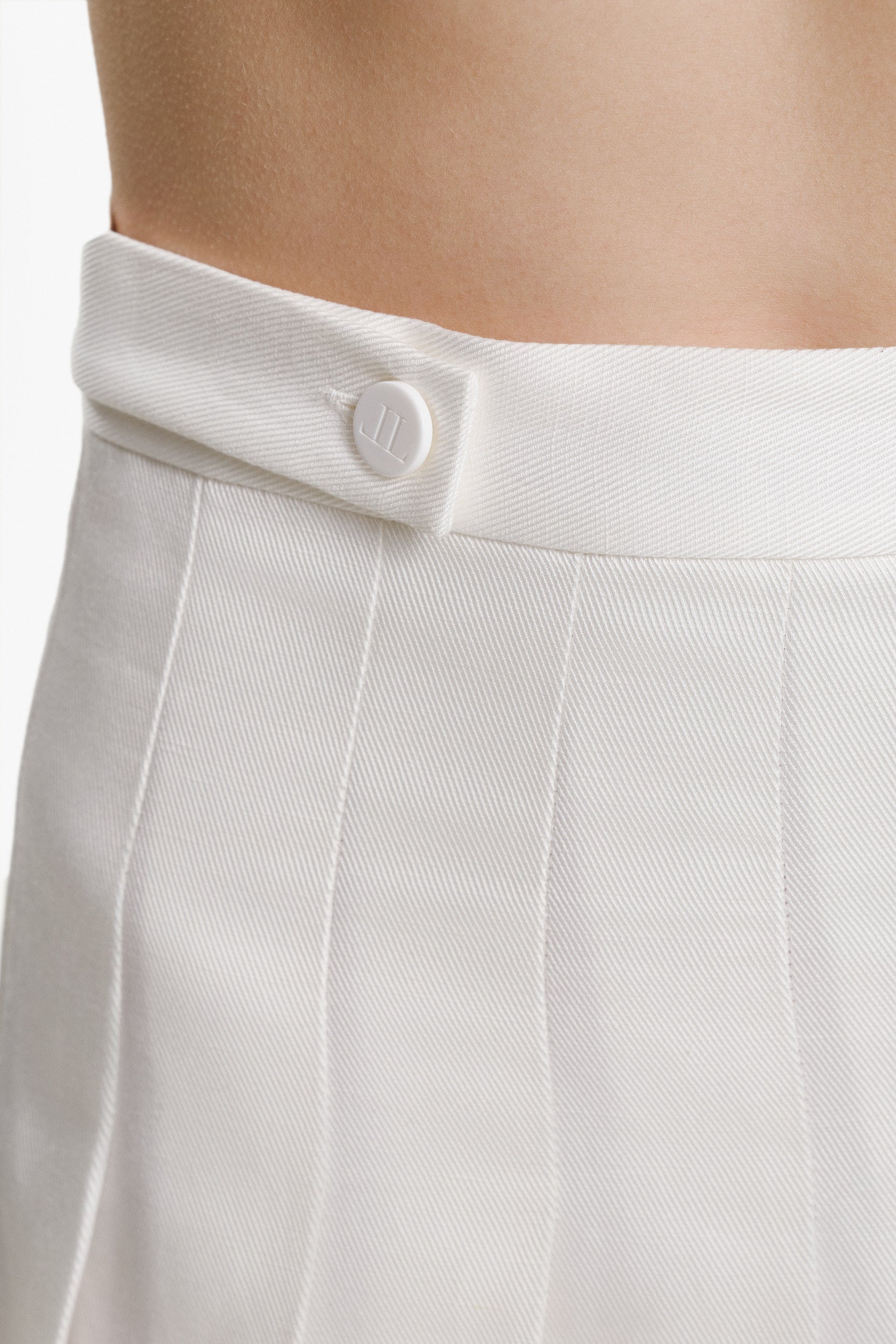 Mini pleated white skirt