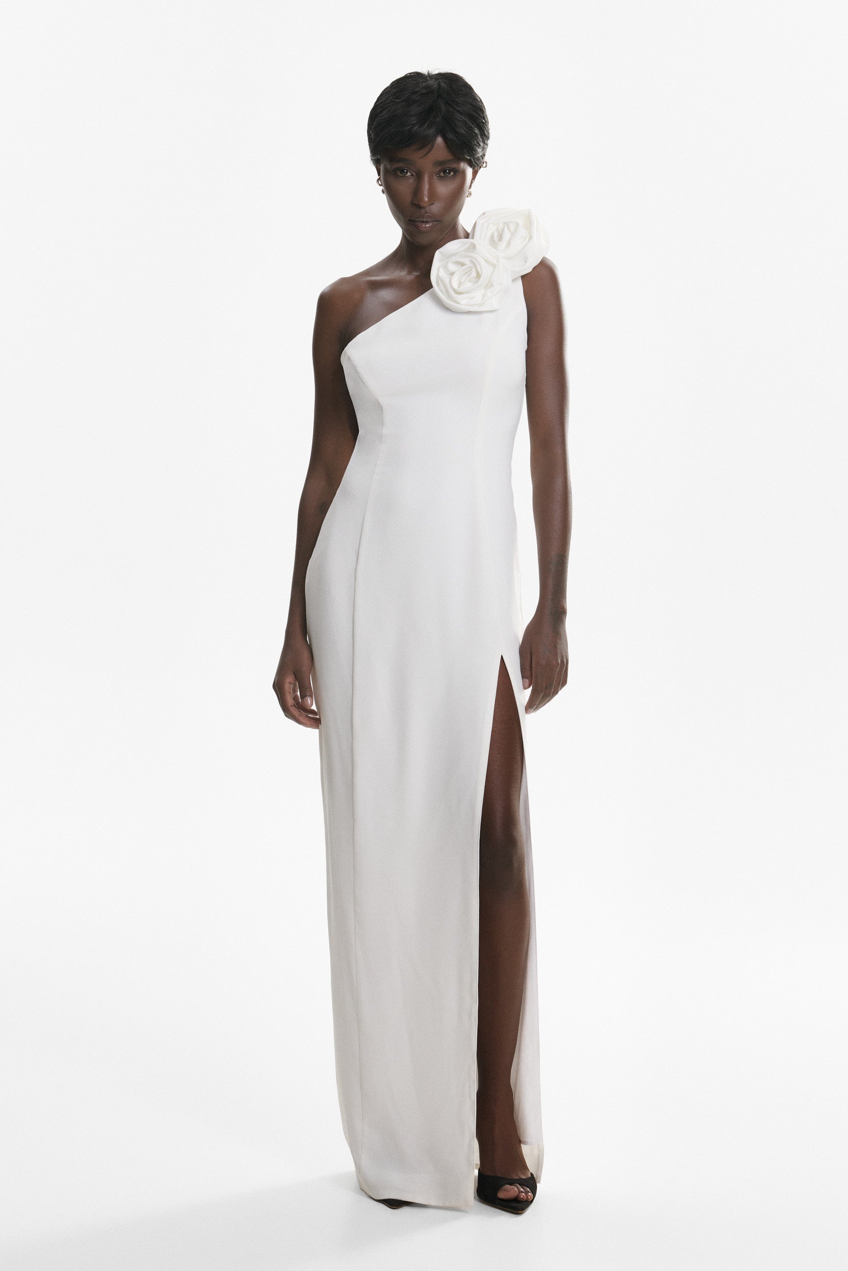 Rosette-appliqué asymmetric crepe dress in white