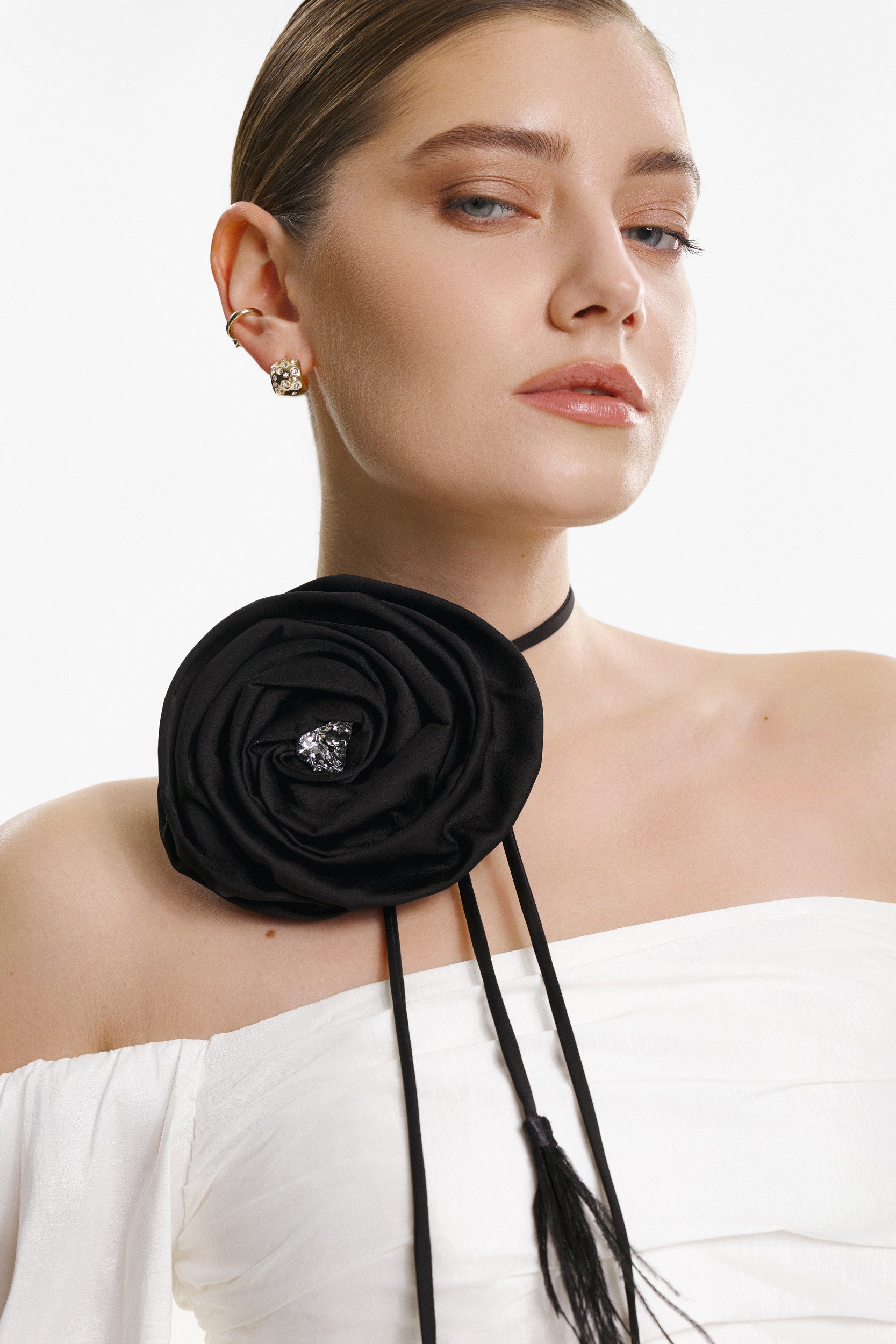 Signature rosette black satin tie with feathers