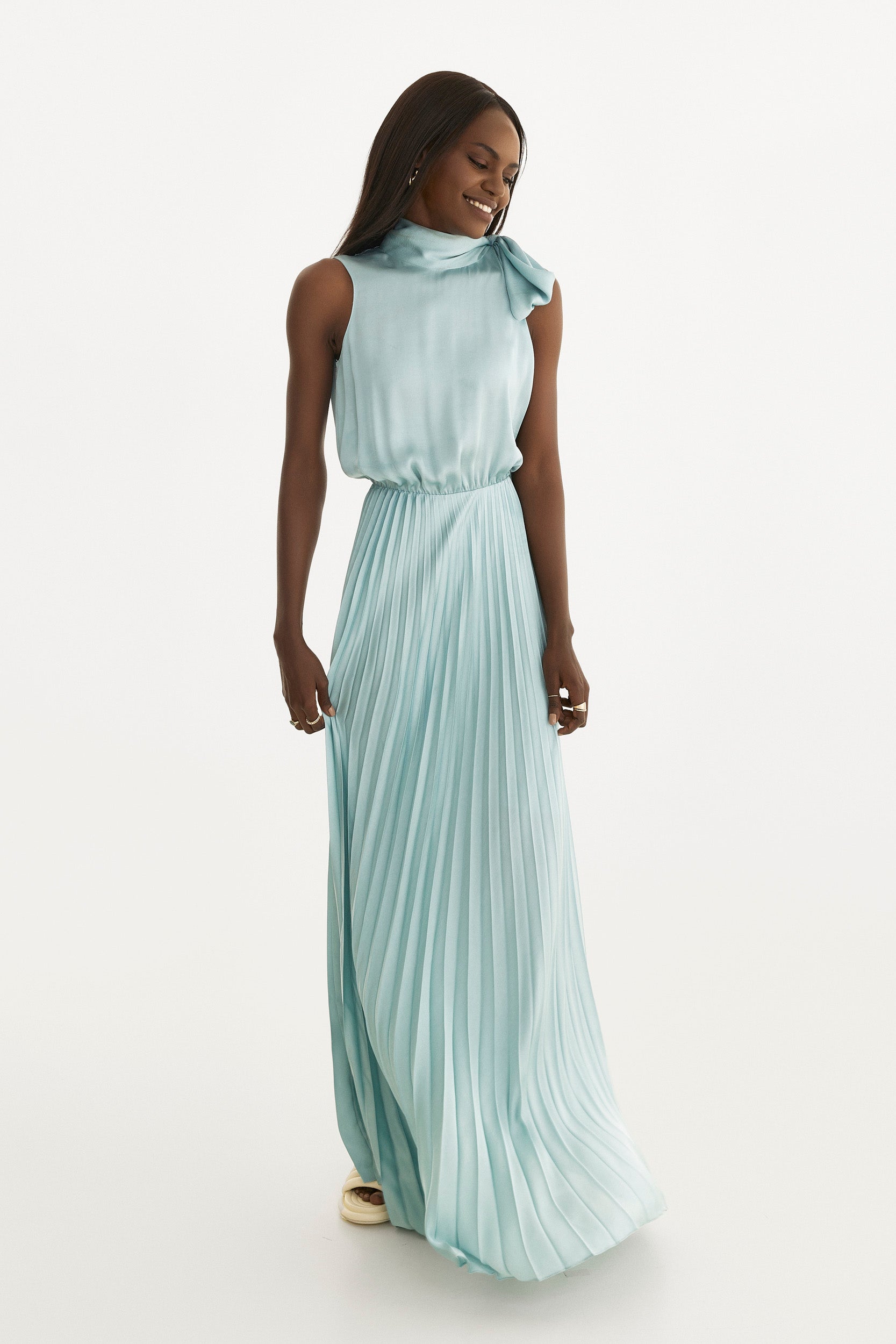 Pleated dress in light blue with tie-shoulder detail
