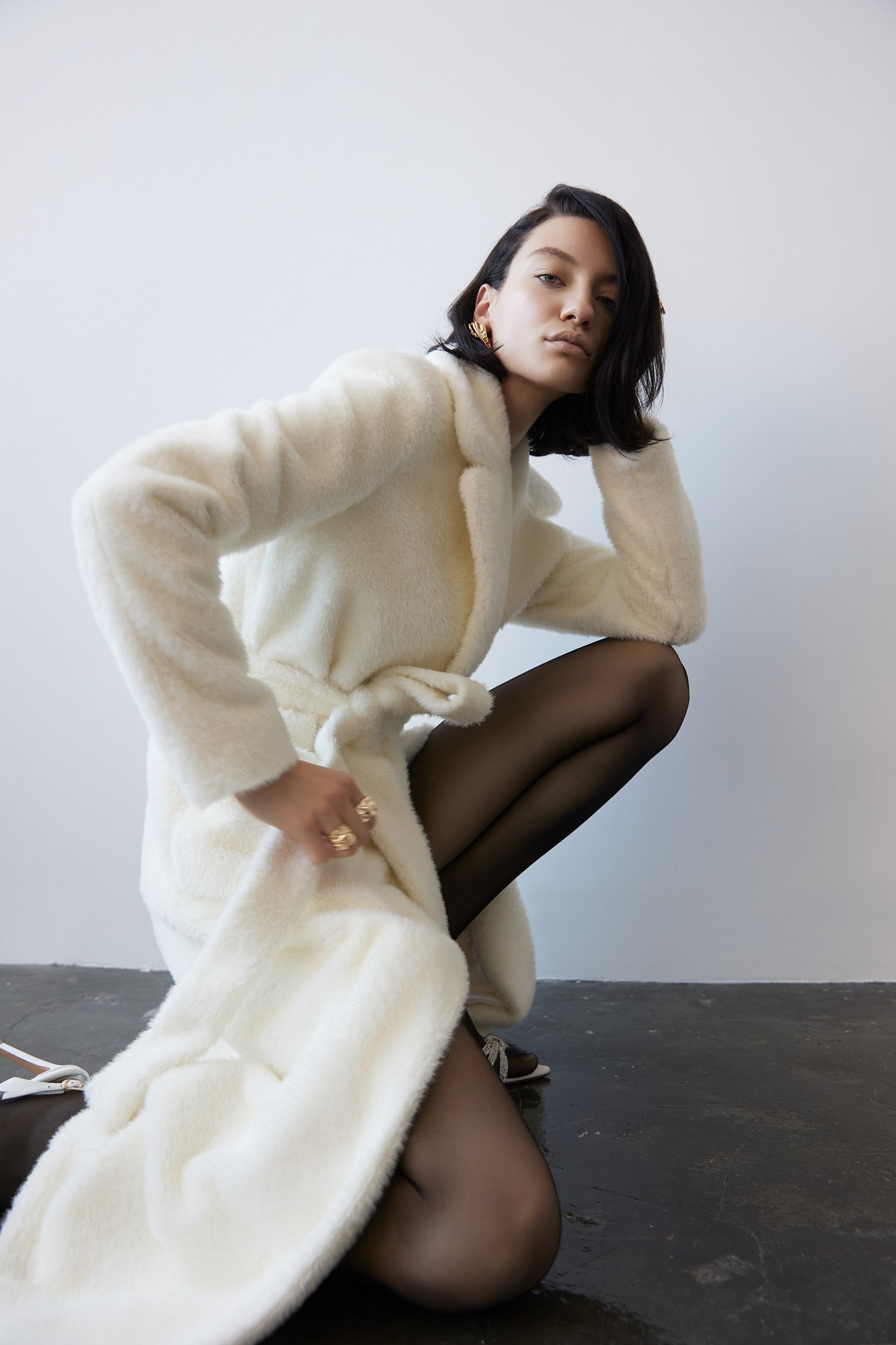 Long faux fur coat in white