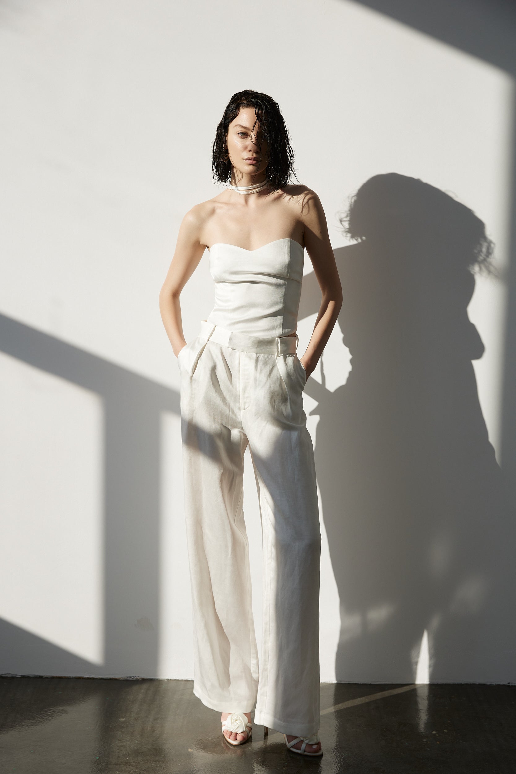 Wide-leg trousers in white linen