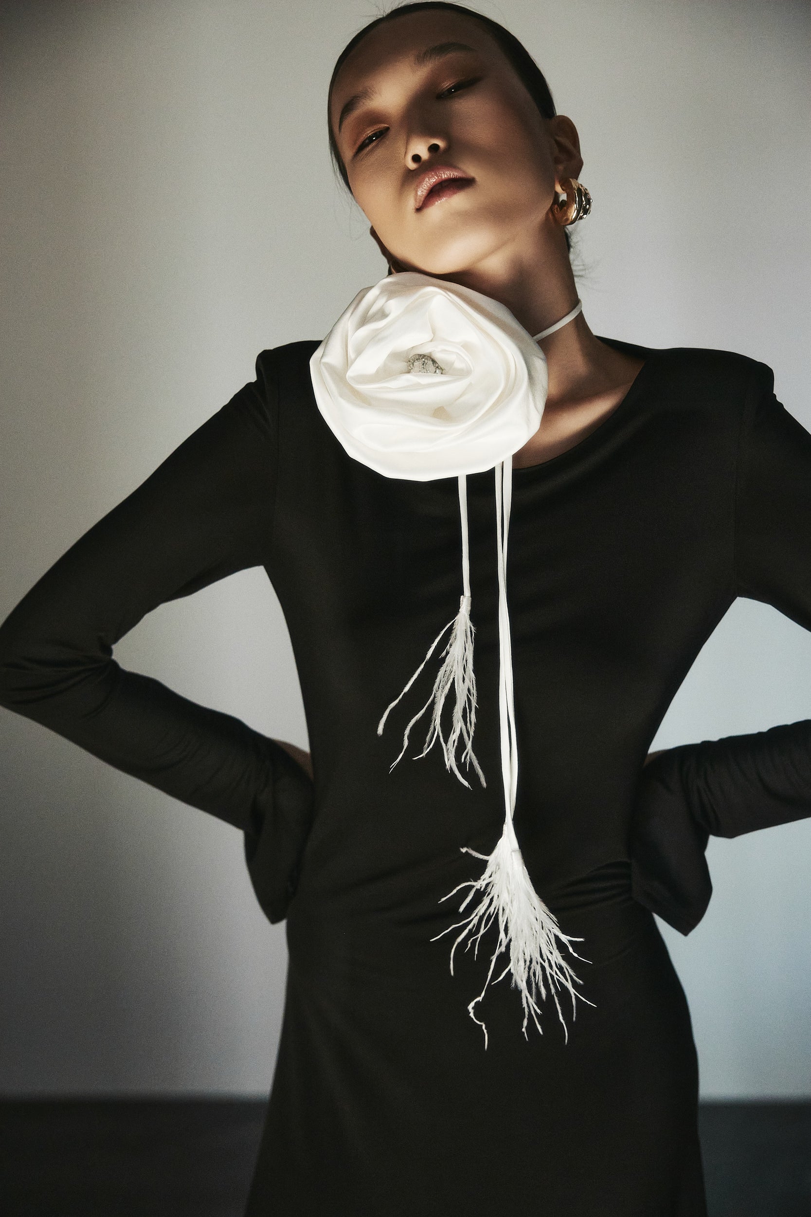 Signature rosette satin tie with feathers