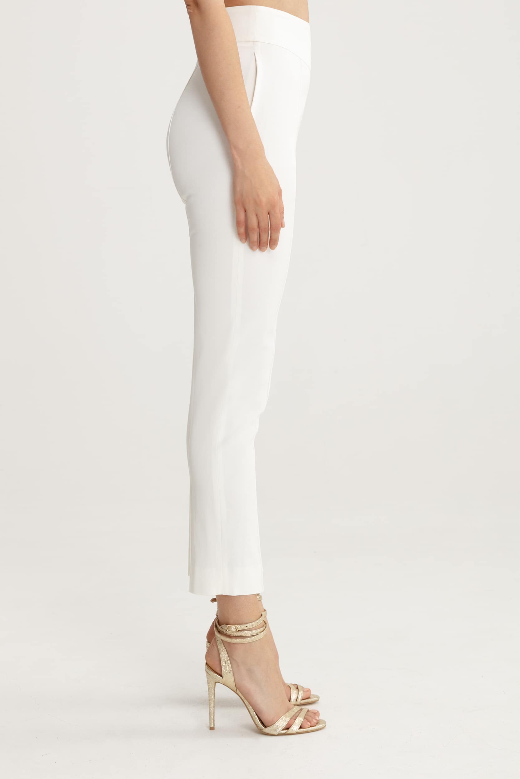 High-waisted white trousers