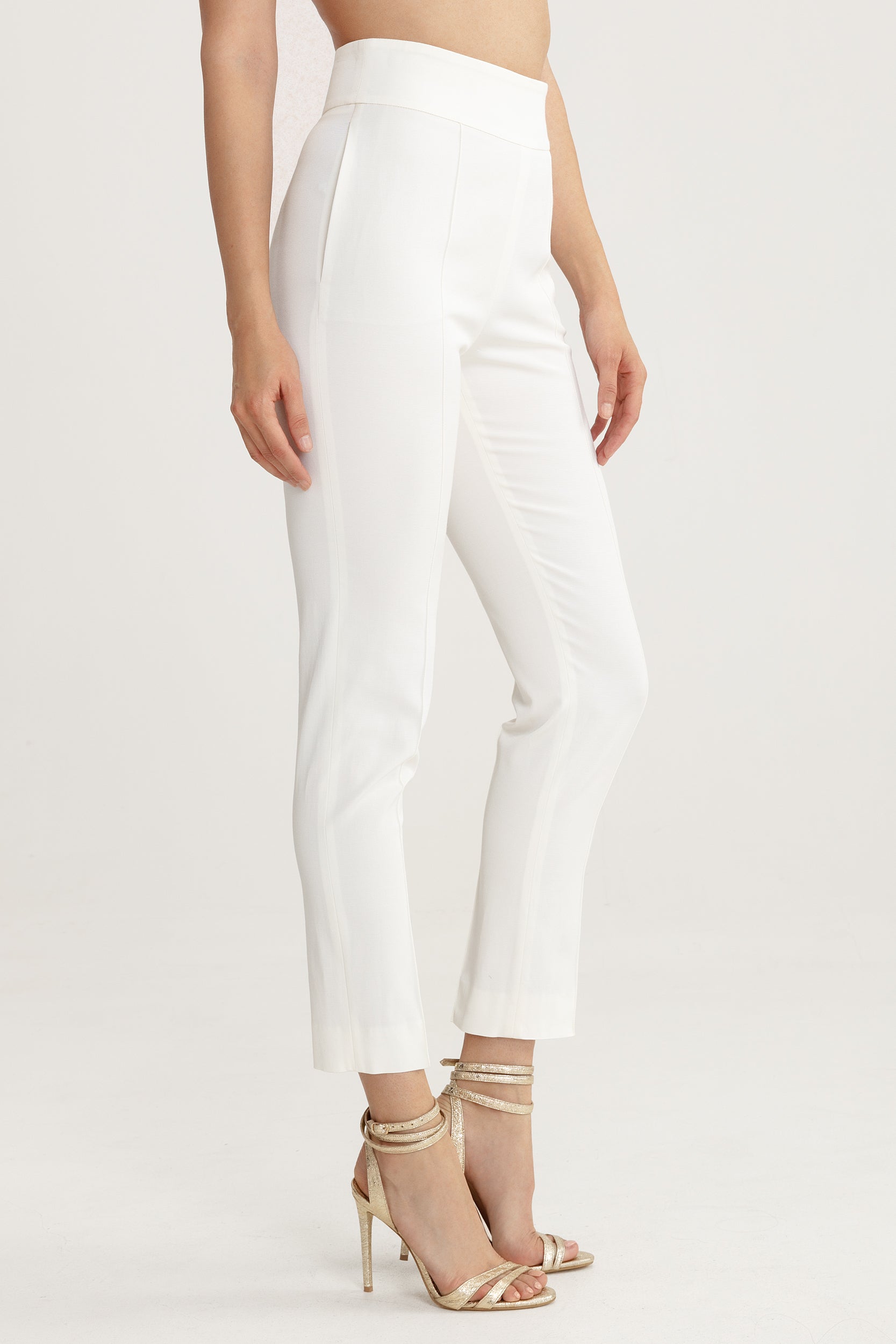 High-waisted white trousers