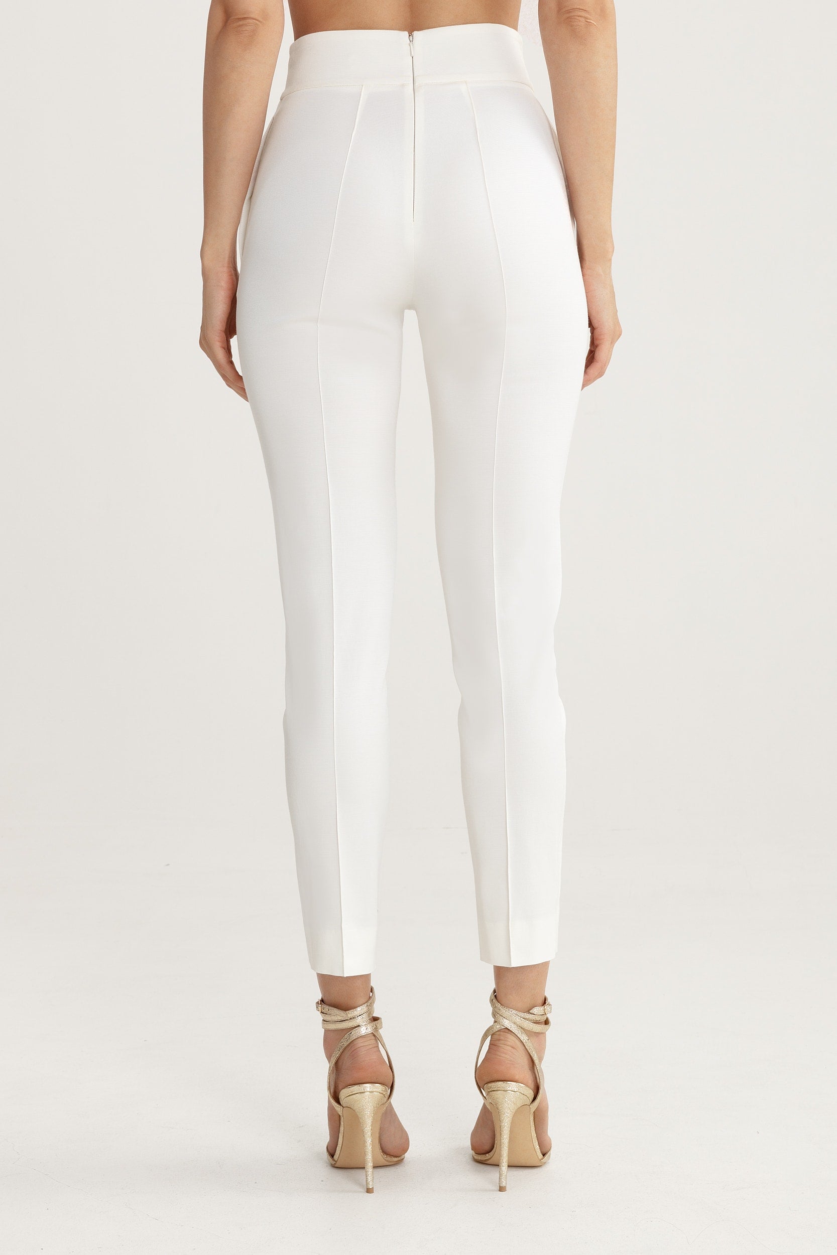High-waisted white trousers